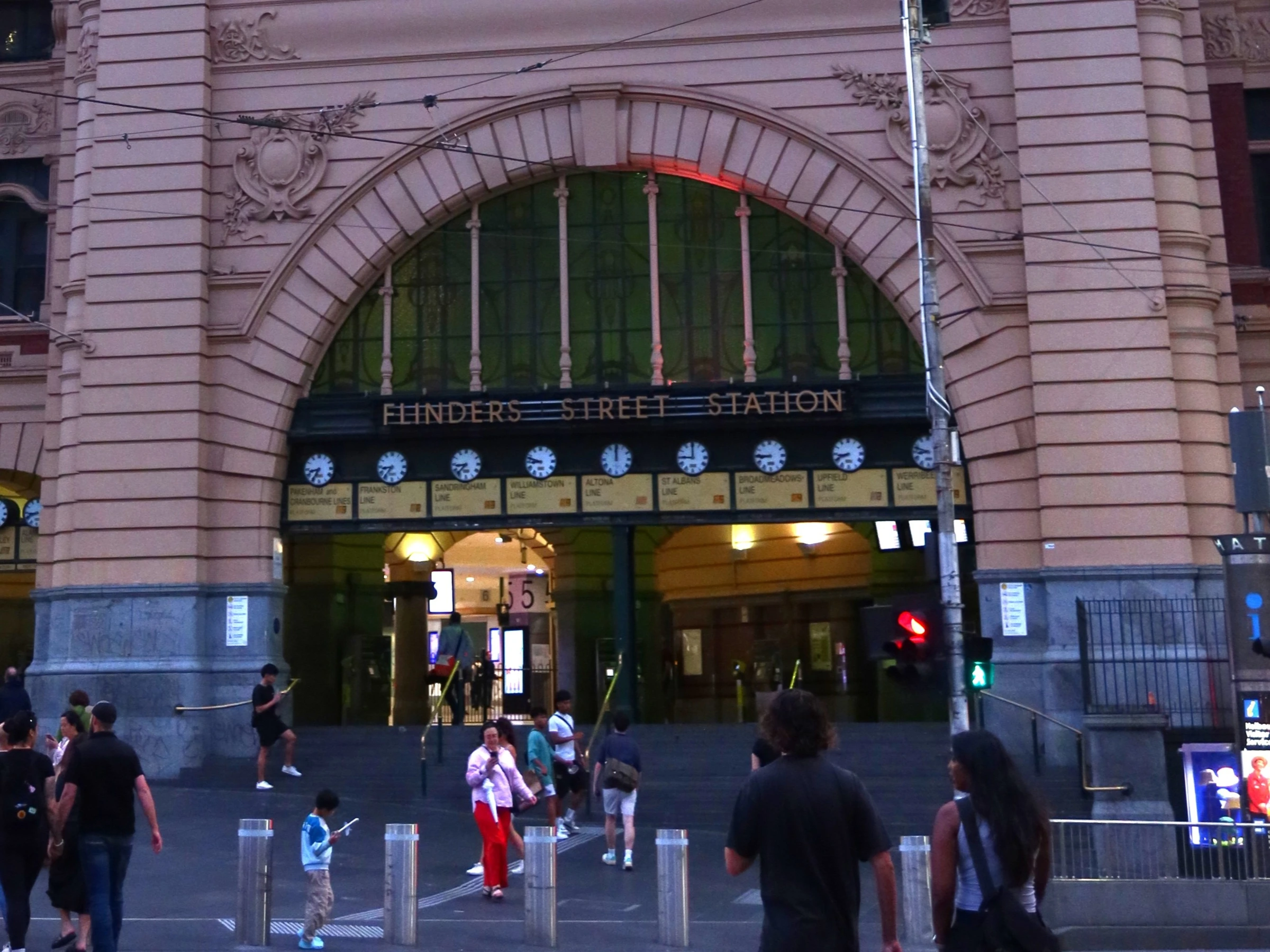 Flinders Street Station’s ochre façade, green dome and clock tower at the corner of Flinders and Swanston streets